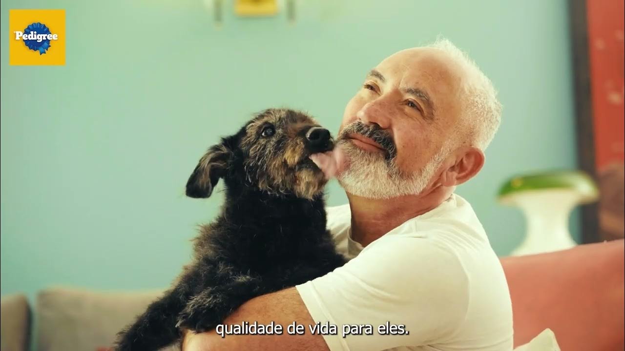 Imagem do cachorro chamado Zulu e seu dono